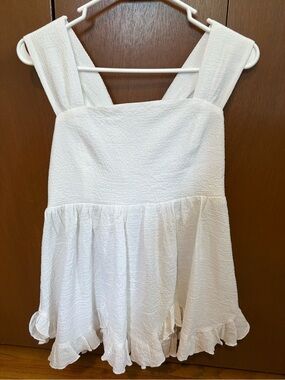 These Three Boutique White Textured Ruffle-Hem Tank Top